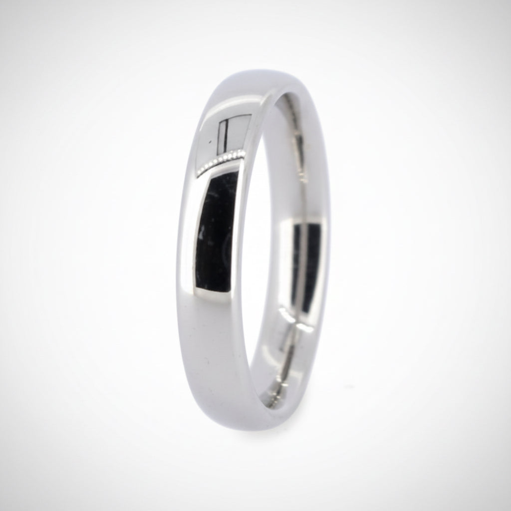 A plain 18ct white gold band ring with a 4mm width, showing a slight court design, on a white background.