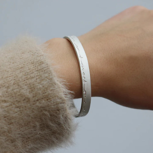 Wide Silver 'on and on' Bangle