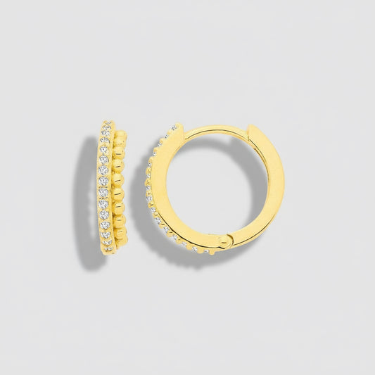 Gold hoop earrings with embedded stones on a white background