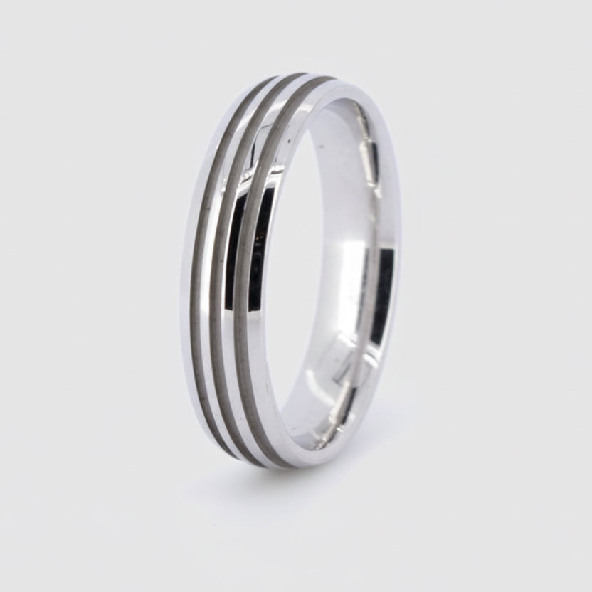A 18ct white gold striped band ring.