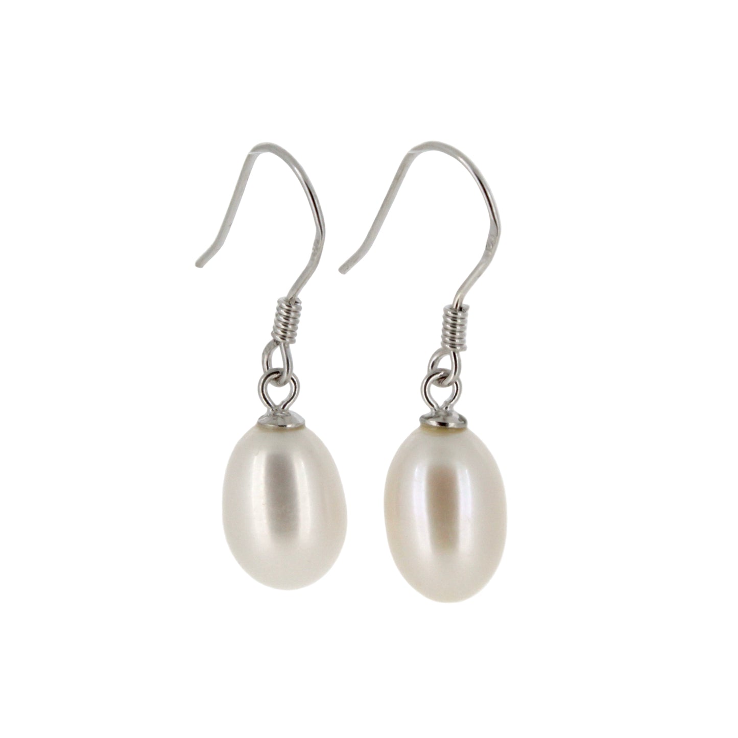 Pearl earrings with silver hooks on a light gray background