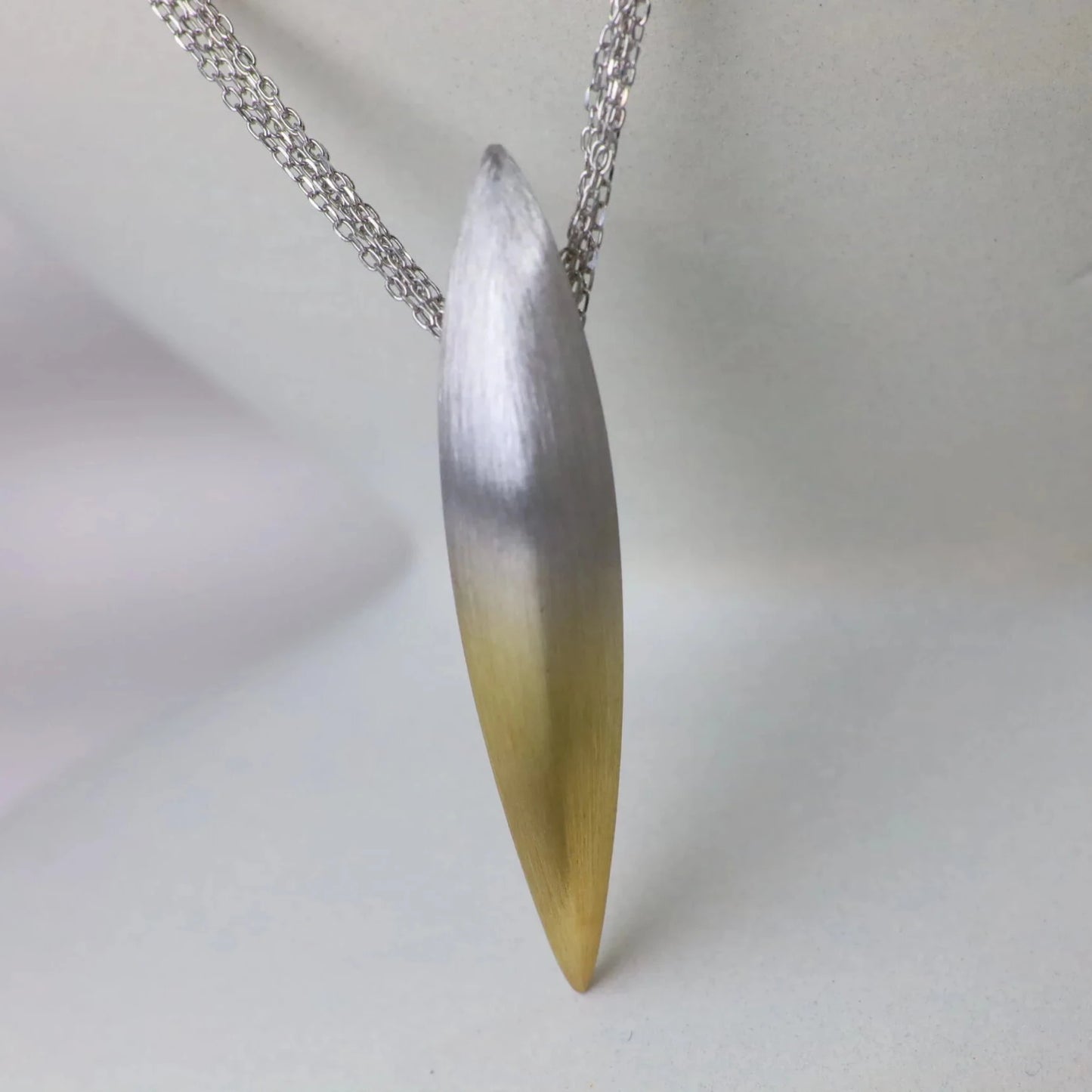 Necklace with a unique pendant on a white background