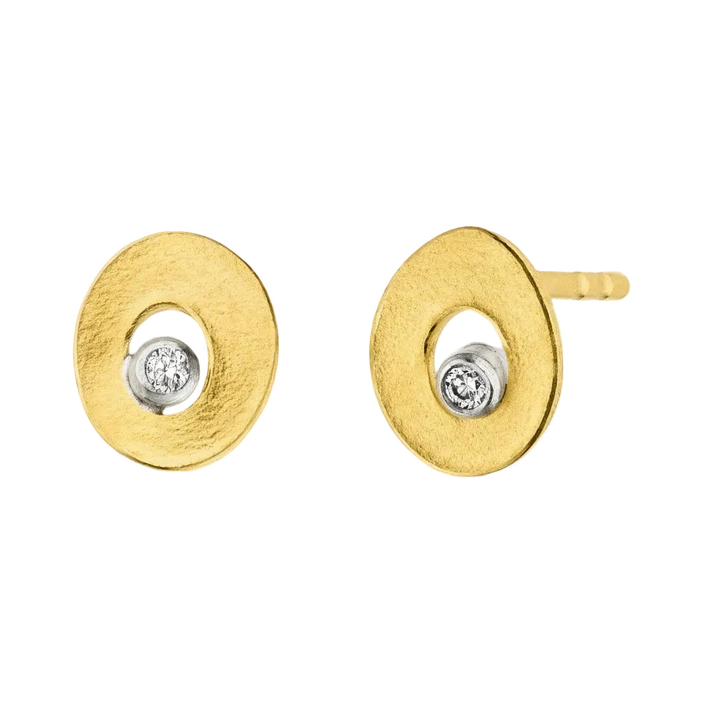 Gold earrings with circular design and embedded diamonds on a white background