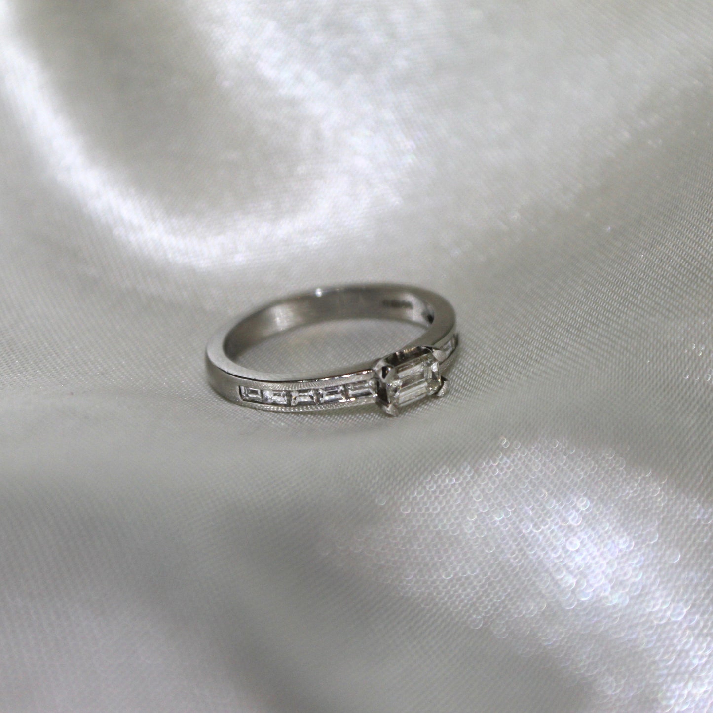 Emerald Cut & Channel Set Platinum Diamond Ring