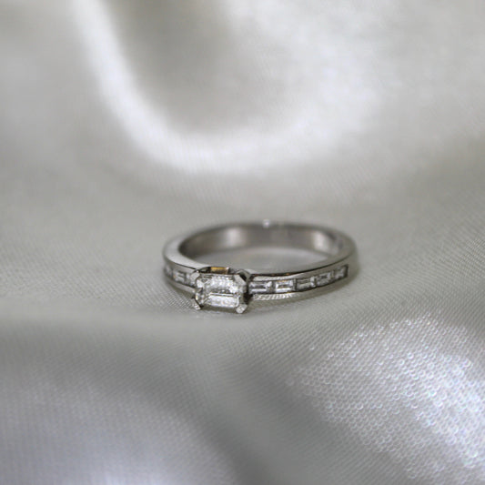 Emerald Cut & Channel Set Platinum Diamond Ring