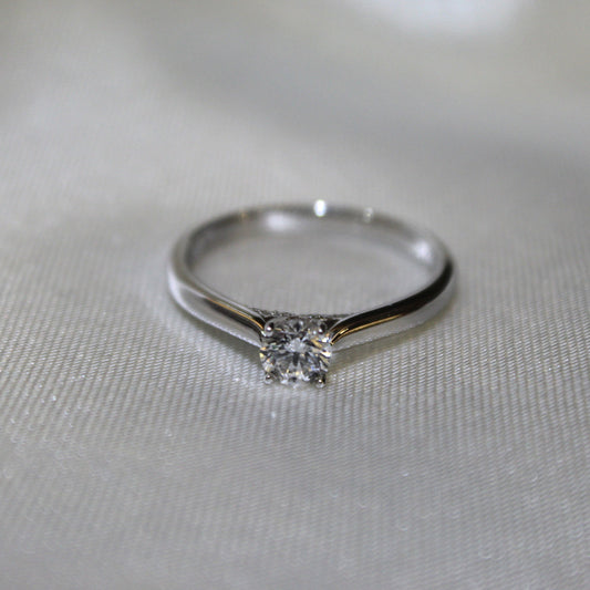 Solitaire Engagement Ring With Diamond Detail