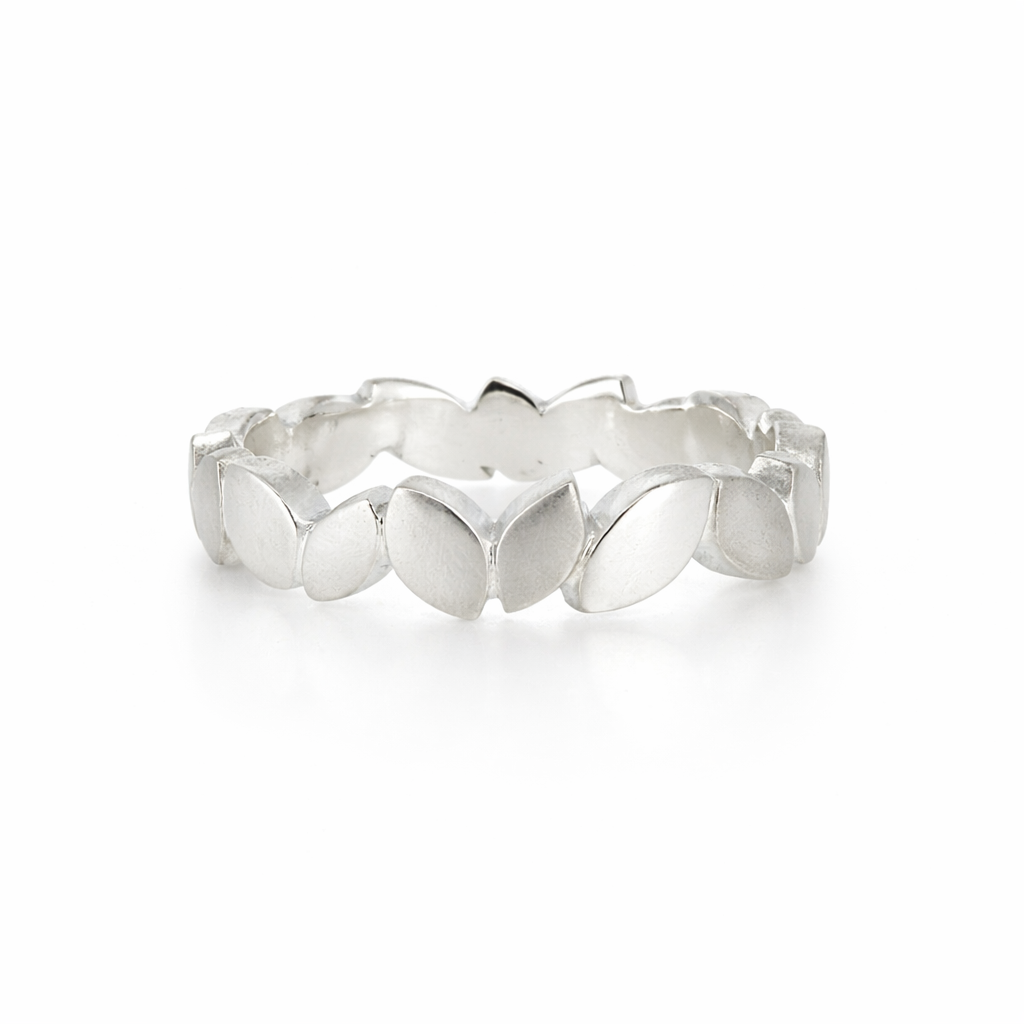 Silver ring with a modern design on a white background