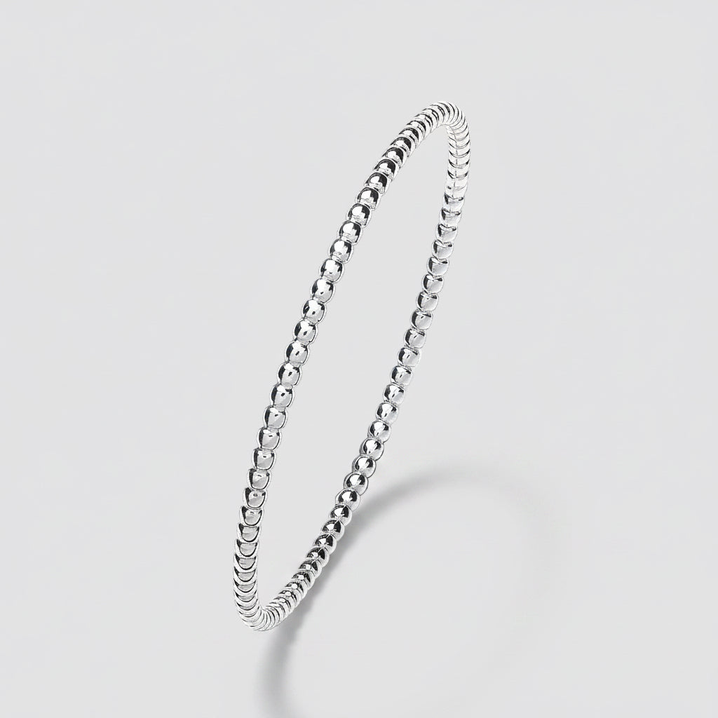 Silver beaded bracelet on a white background