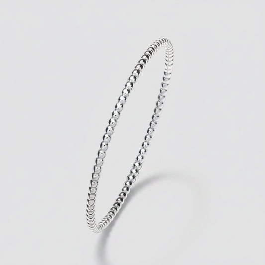 Silver beaded bracelet on a white background