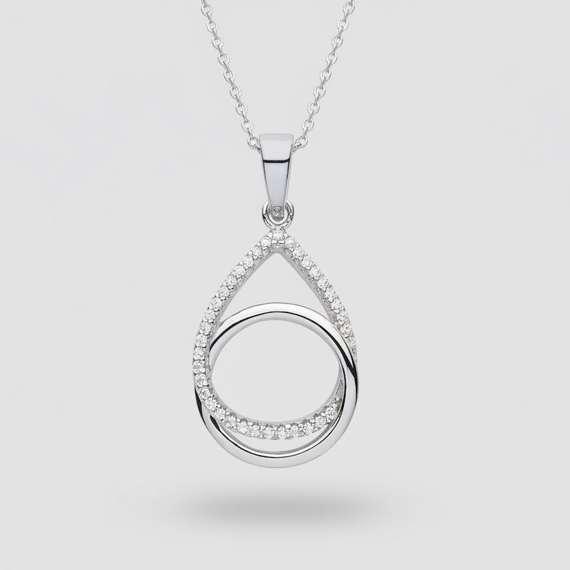 Silver teardrop-shaped pendant with small diamonds on a white background