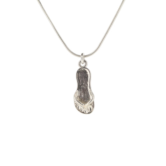 Silver flip-flop sandal pendant on a chain against a white background