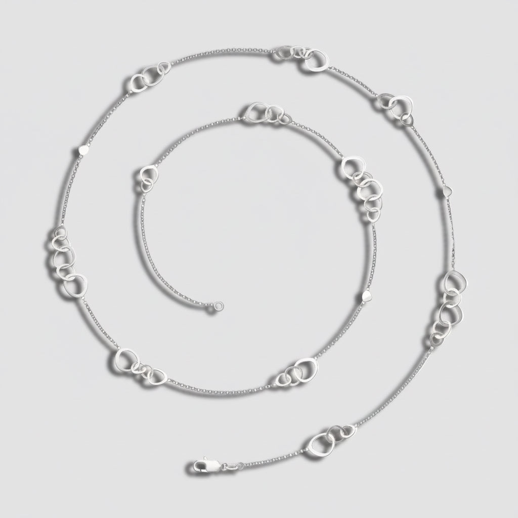 Silver chain necklace on a white background