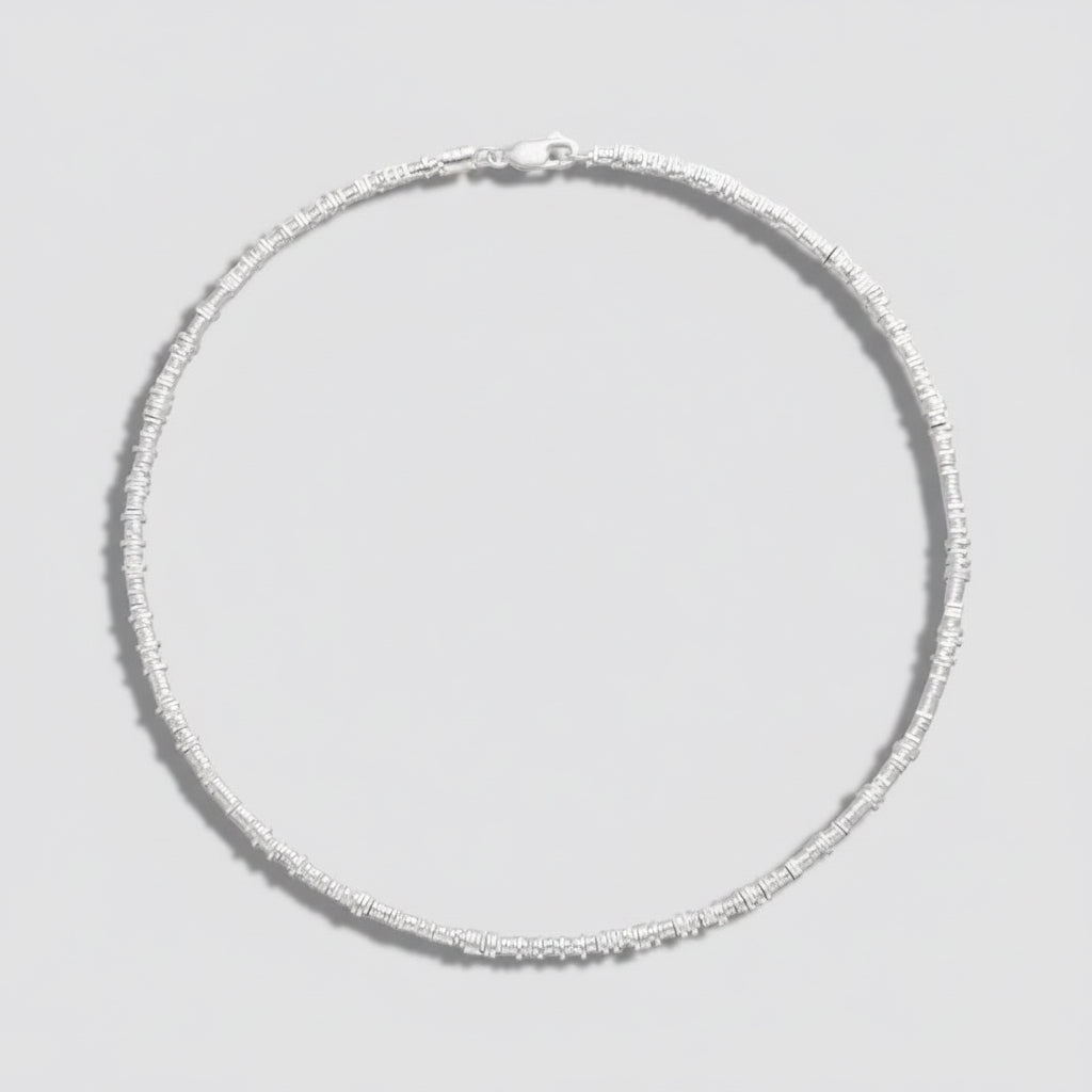 Silver necklace on a white background