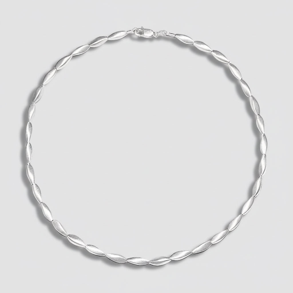 Silver necklace on a white background