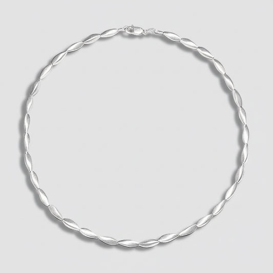 Silver necklace on a white background