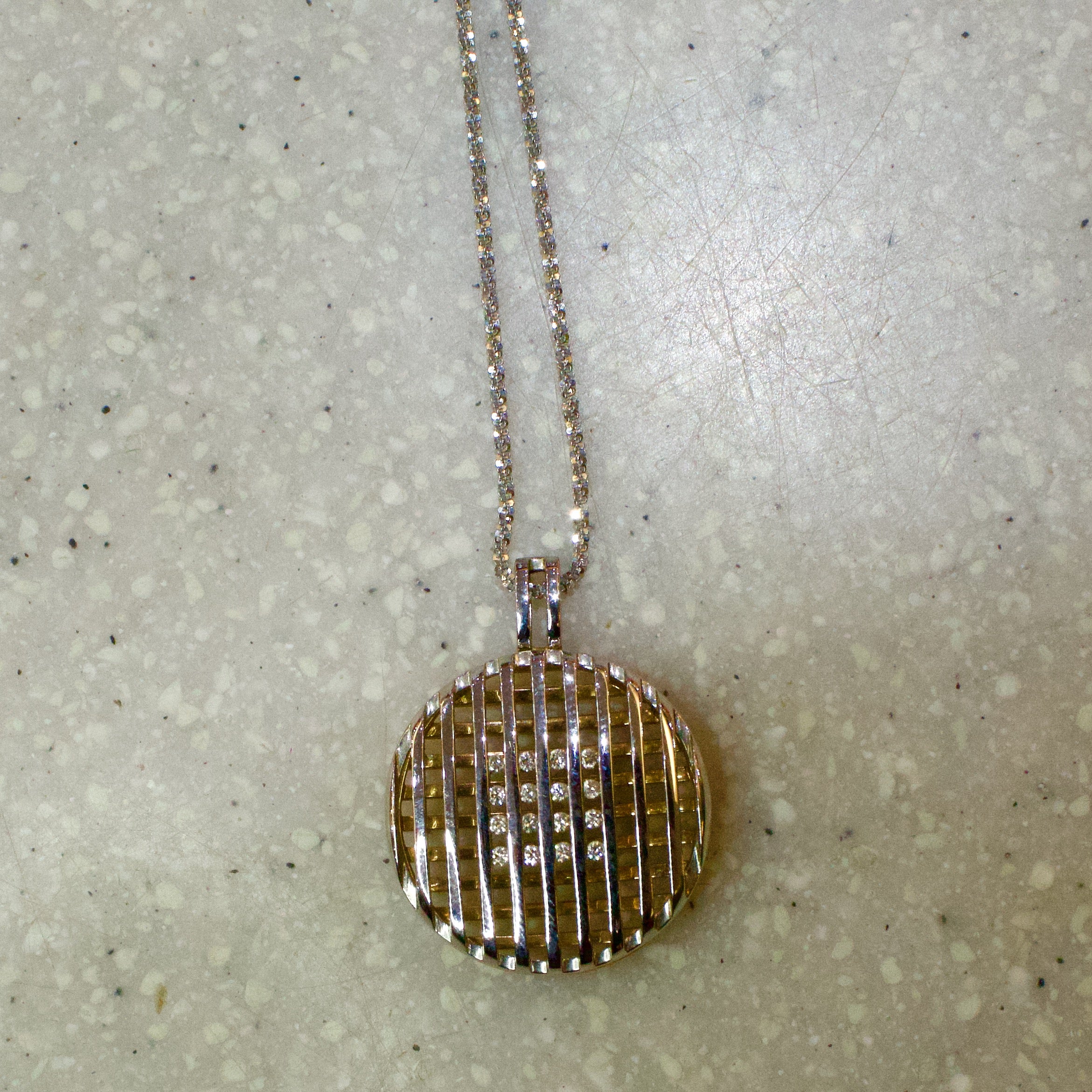 Diamond store cage pendant